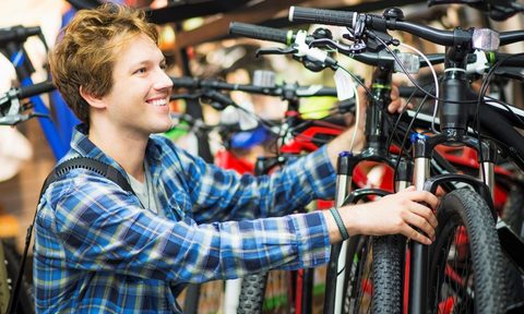 A customer shops for a mountain bike