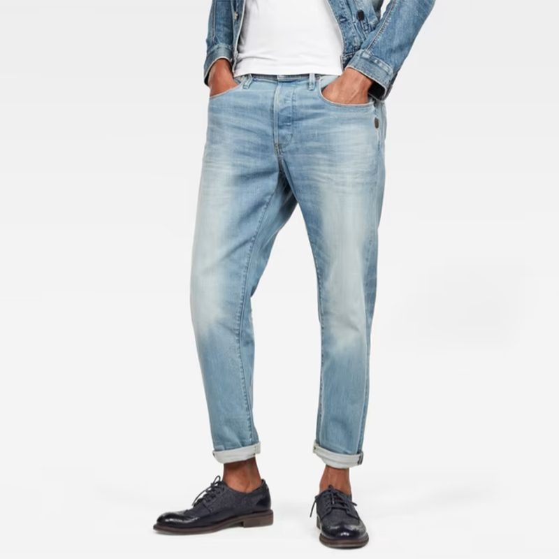 G-Star Raw Loic Relaxed Tapered Jeans with an undershirt, a denim jacket, and leather shoes.