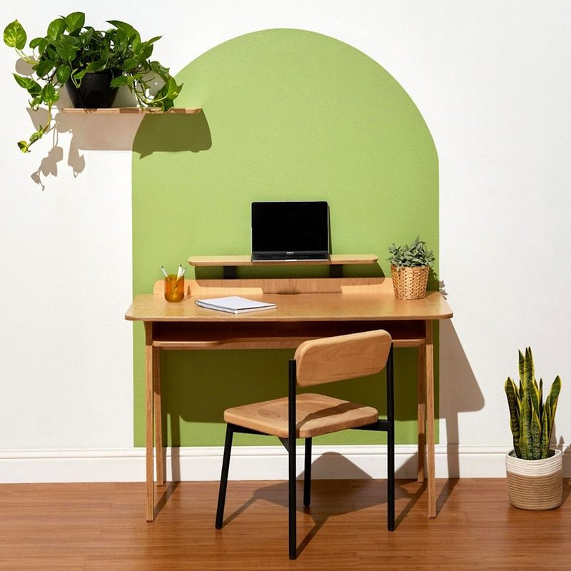green-themed work table from inside weather.