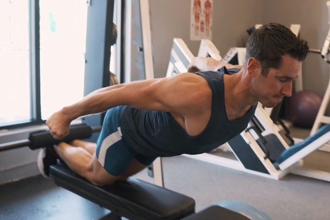 Man doing hamstring curls