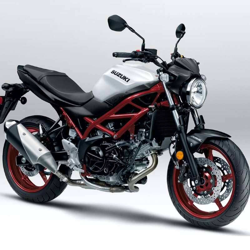 Front side profile of a Suzuki SV650 in a white studio backdrop