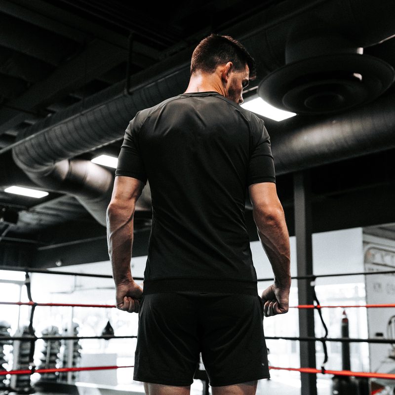 A man wearing Ten Thousand's workout apparel.