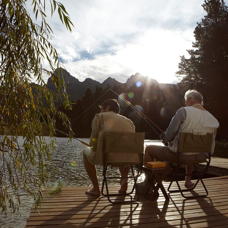 men fishing under the sun.