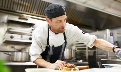 best chef hats in kitchen near stove