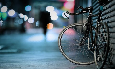 bike on sidewalk at night