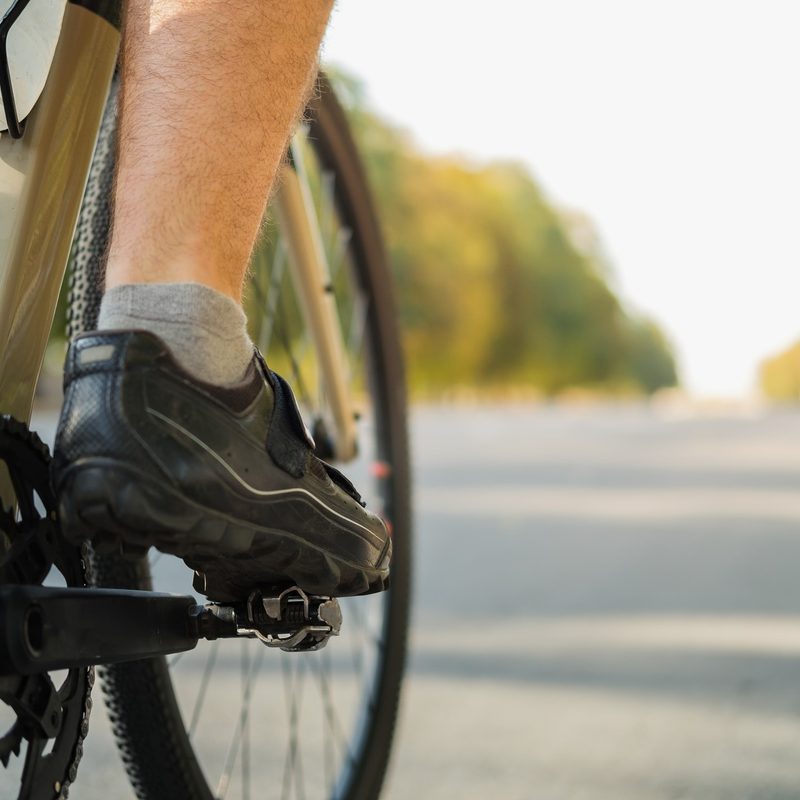 Man cycling on road