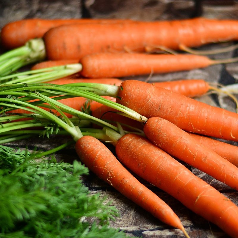 Carrots with their tops.