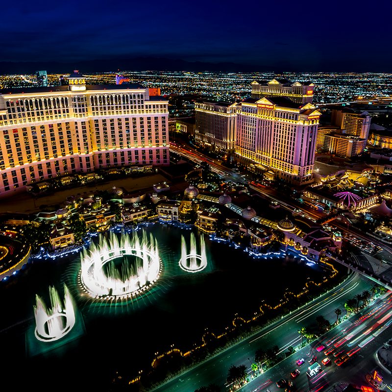 Panoramic view of Las Vegas at night with neon from Paris Eifel Tower