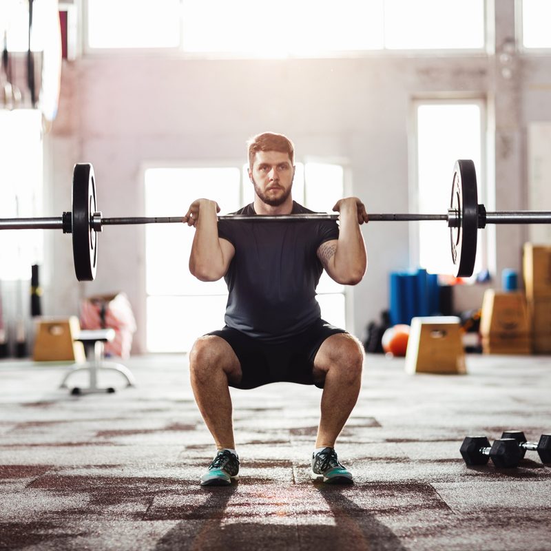 Young man exercising in the gym