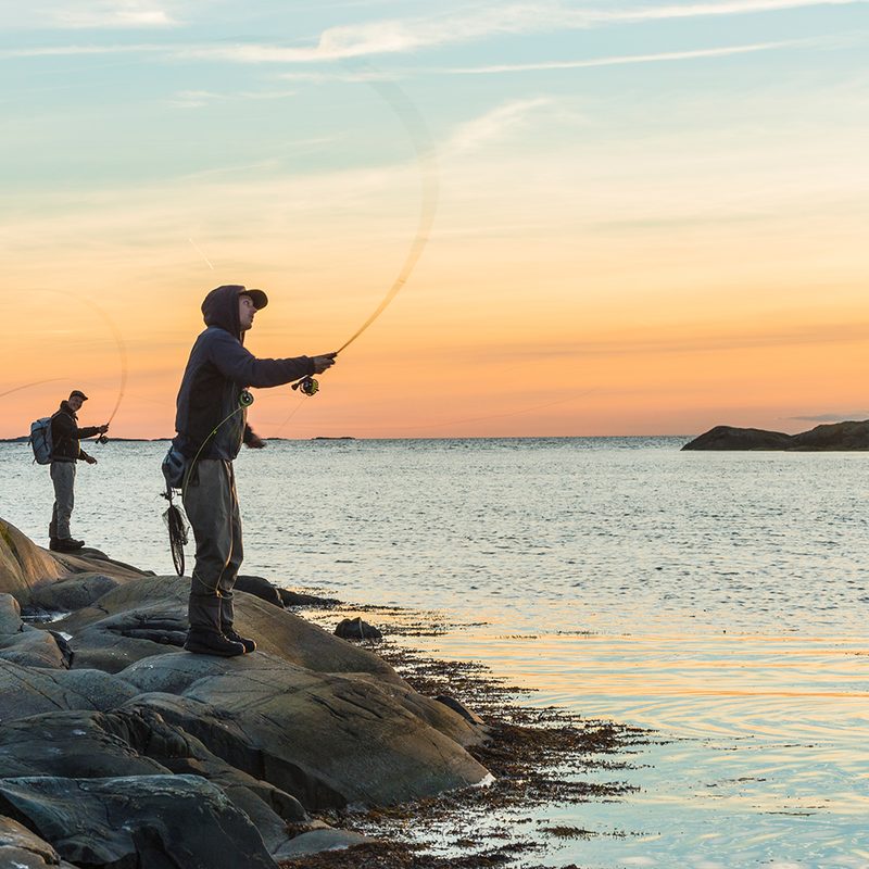 Men fishing at sea
