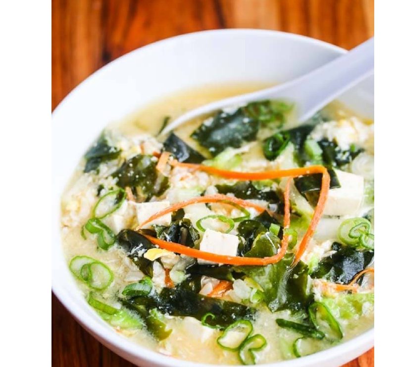 Miso soup with tofu, wakame seaweed, rice and egg
