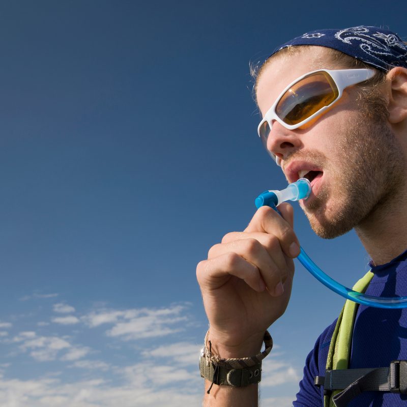 Man blowing whistle.
