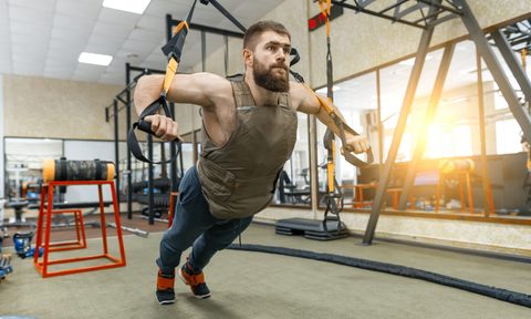 best weighted vests muscular bearded man dressed in militar