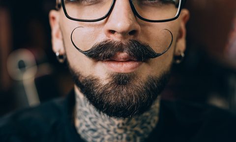 Man with a handlebar mustache.
