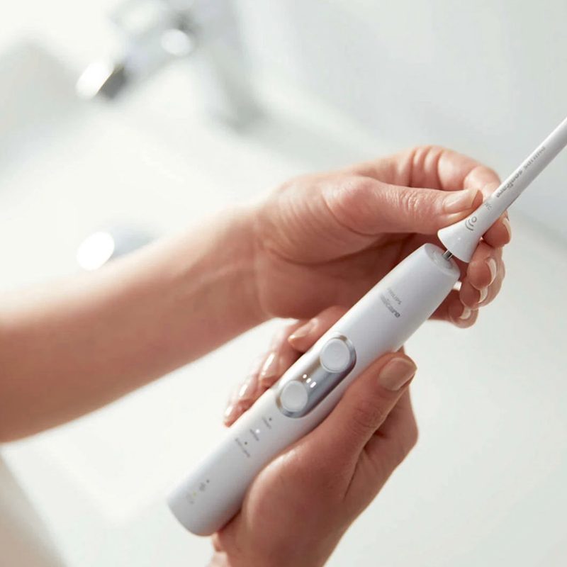 replacing an electric toothbrush head
