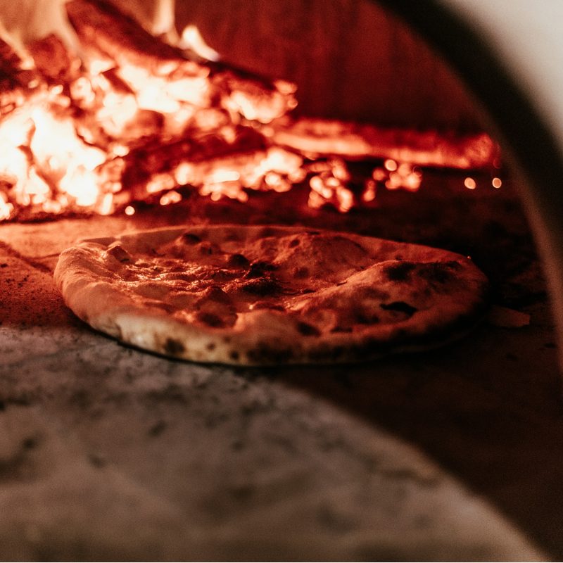 Pizza in a pizza oven