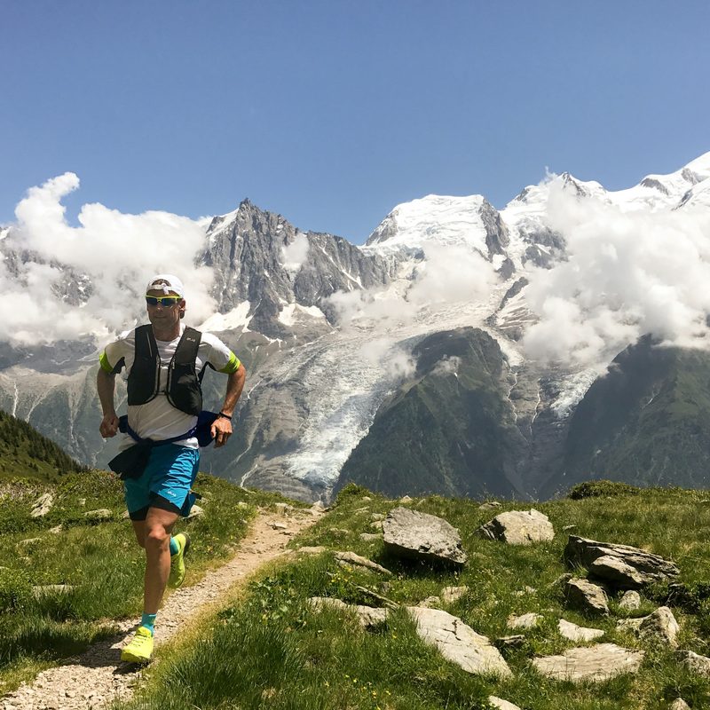 Man running on trail.