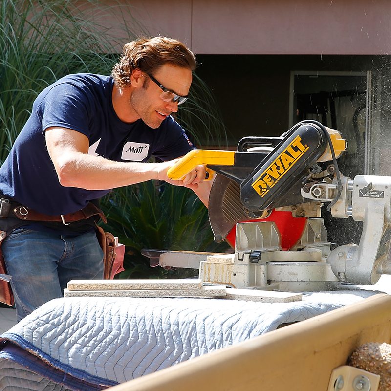 HGTV's Matt Blashaw woodworking with a DeWalt tool.