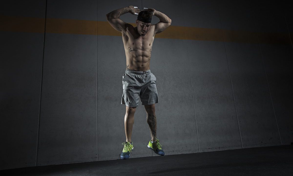 Man doing burpees.