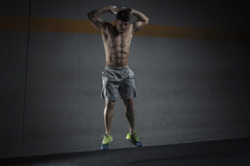 Man doing burpees.
