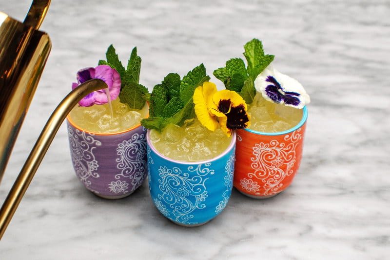 Three glasses filled with Aba Shady Beach Cocktail.
