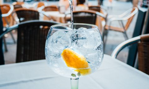 Close view of gin and tonic being served at the terrace bar.