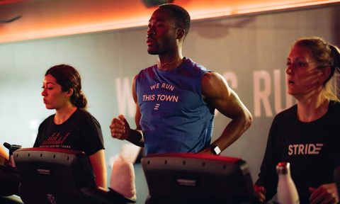 Three athletes running on treadmills at Stride.