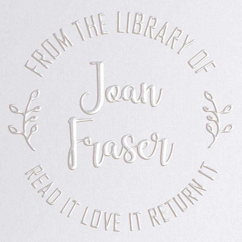 Book embosser by Pickled Stamps on a white background.