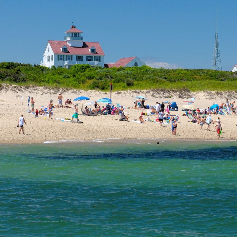 People enjoying the view at Coast Guard Beach in Cape Cod