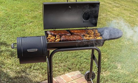 Char-Broil American Gourmet Offset Smoker grilling meat on patio