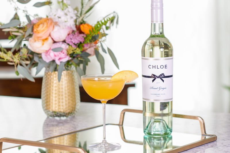 A glass of Chloe's Peach Punch Cocktail.