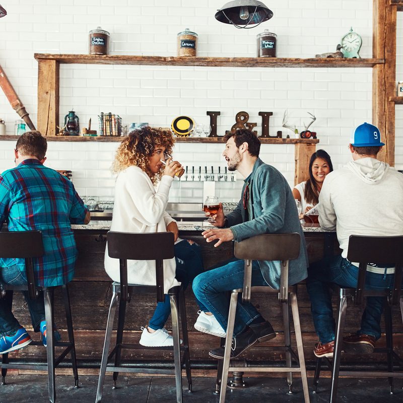 Couples having a good time at a bar