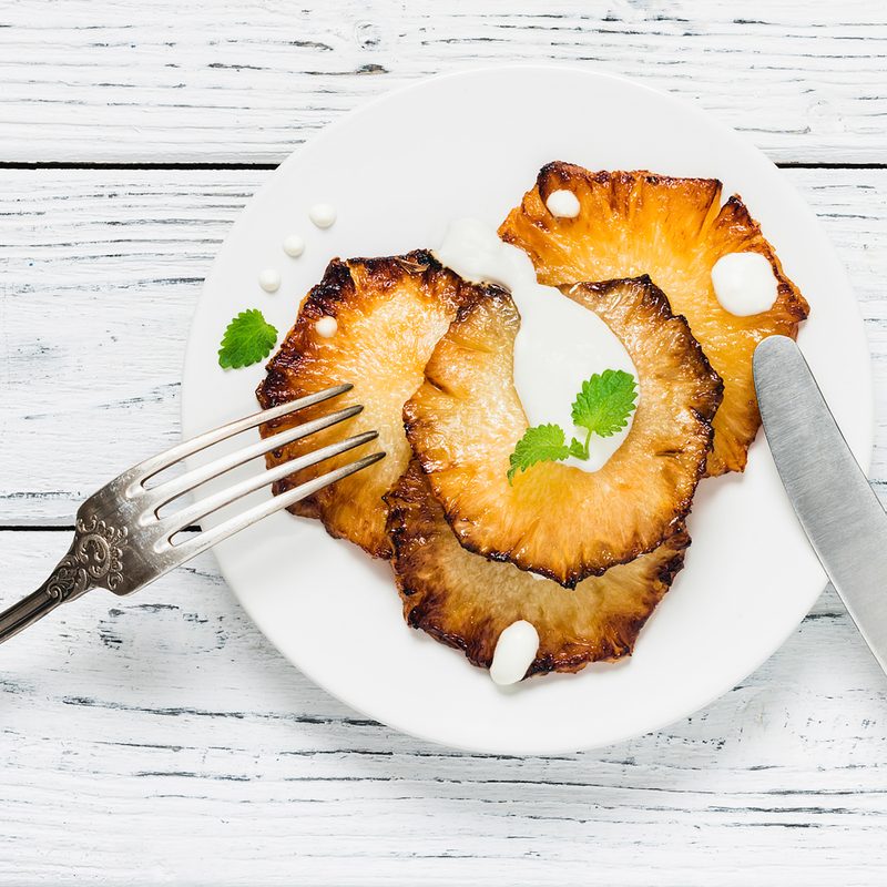 Fresh pineapple with crème fraîche and mint