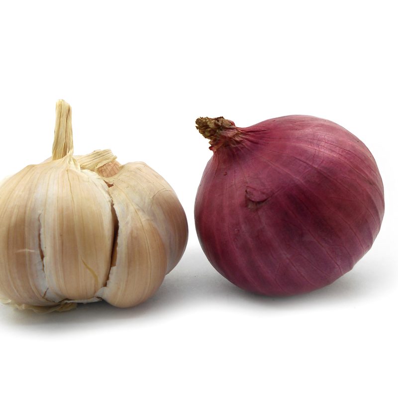 Garlic and Onion as an insect repellant alternative on a white background