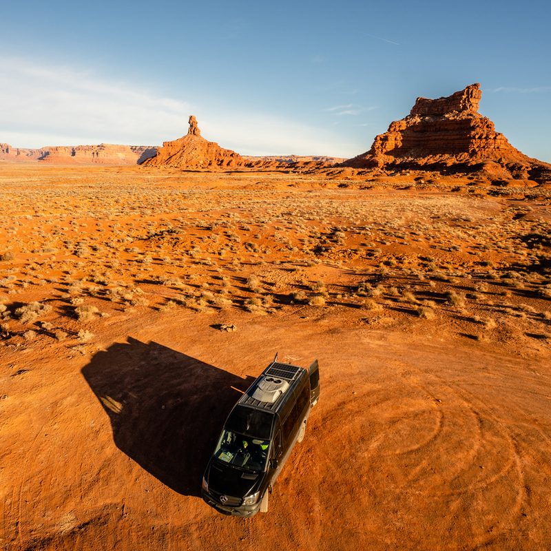 A bird's eye view of a converted sprinter camper van at the Valley of the Gods.
