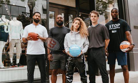 Group of people in front of wilson store