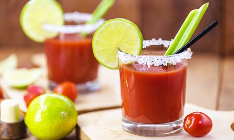 how to make a bloody caesar canadian drink  made with vodka hot sauce and worcestershire served ice in celery glass salted ri