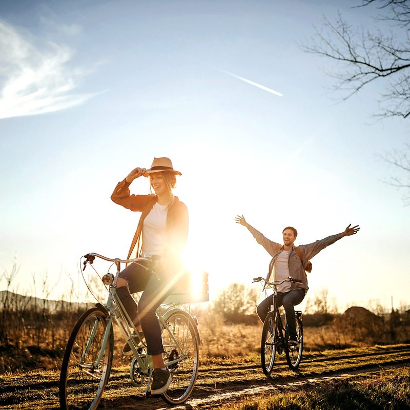 A couple taking a scenic bike ride.