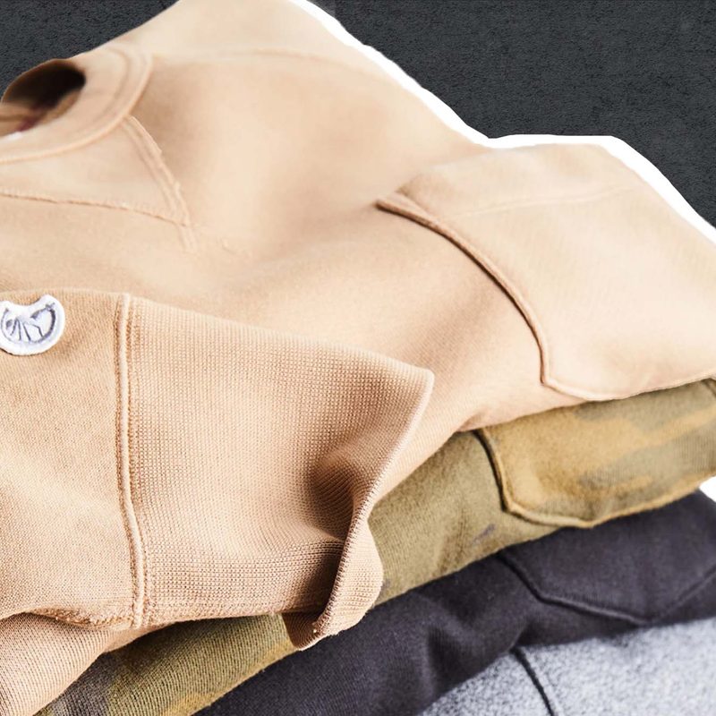 Man wear a Todd Snyder Sweatshirt.