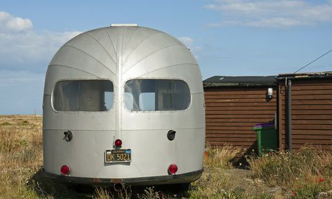 Airstream trailer in field