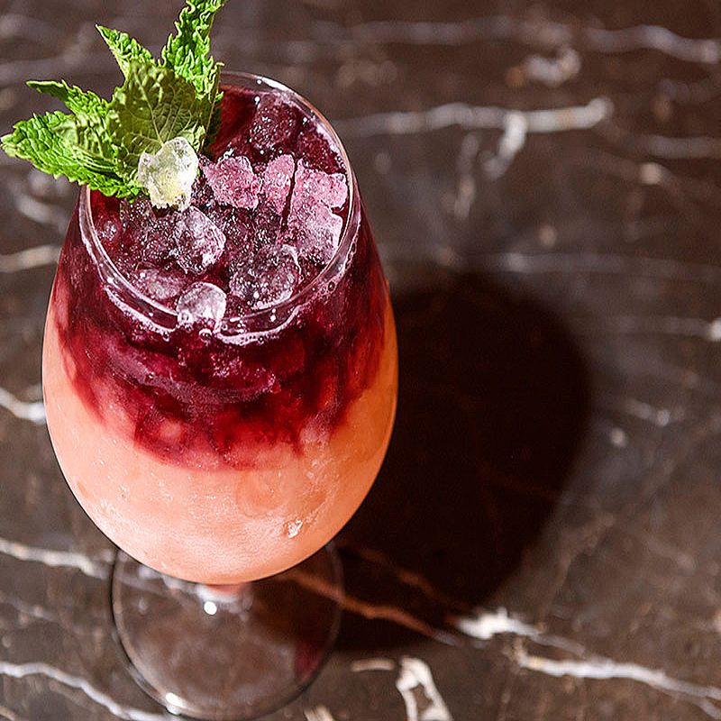 An ice-cold glass of watermelon cooler.