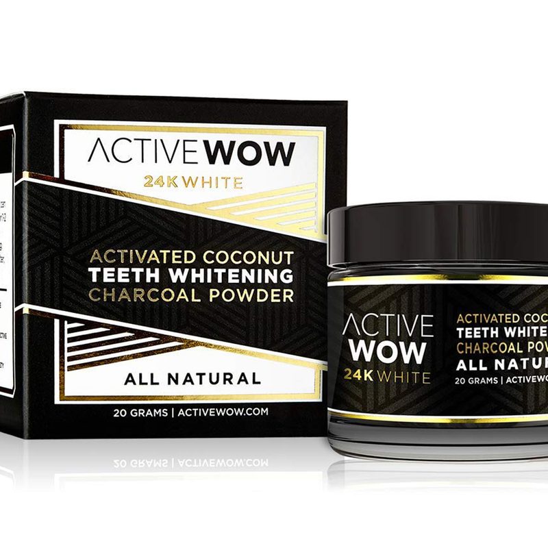 Active Wow charcoal powder teeth whitening kit on white background.