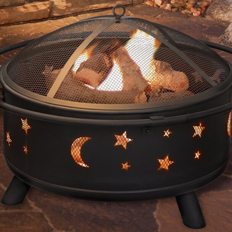 Aditya Star and Moon Fire Pit in backyard.