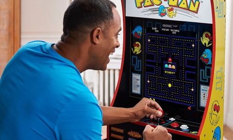 Arcade1UP countercade being played on counter.