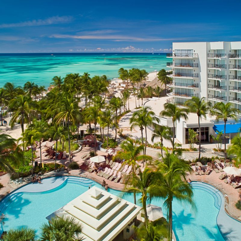 Aruba Marriott Resort aerial shot with pool and Palm beach in the background.