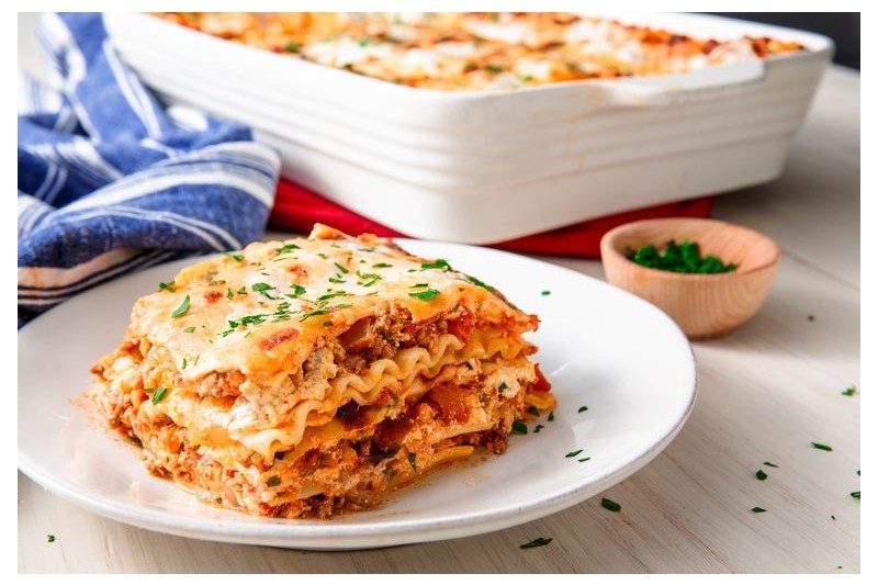 Serving of lasagna from Delish.