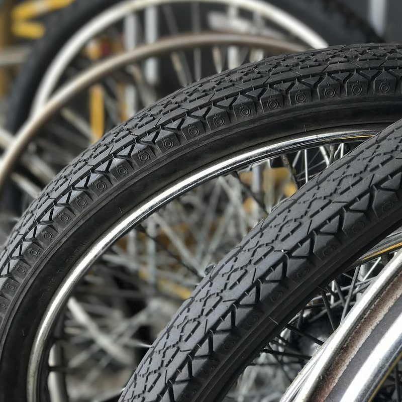 A close-up of bicycle tires.