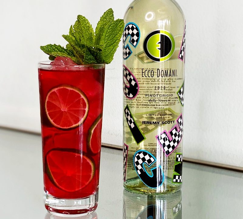 Bold + Mint Tea cocktail with wine bottle.