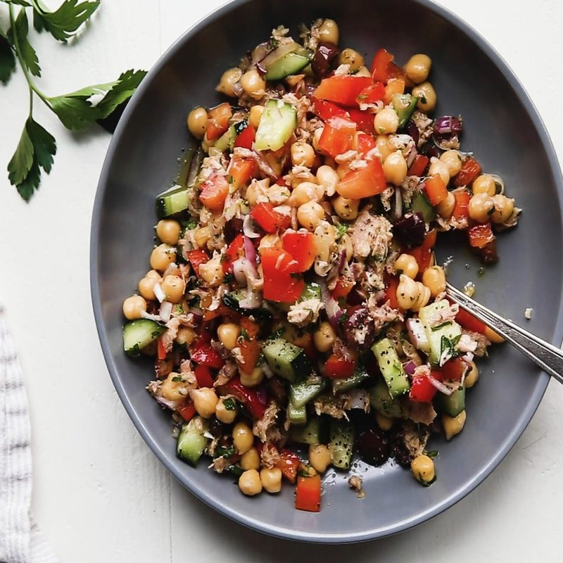 A plate of chickpea tuna salad on a table.