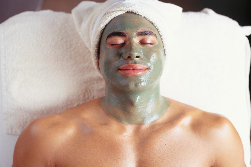 A man with a facial mask.